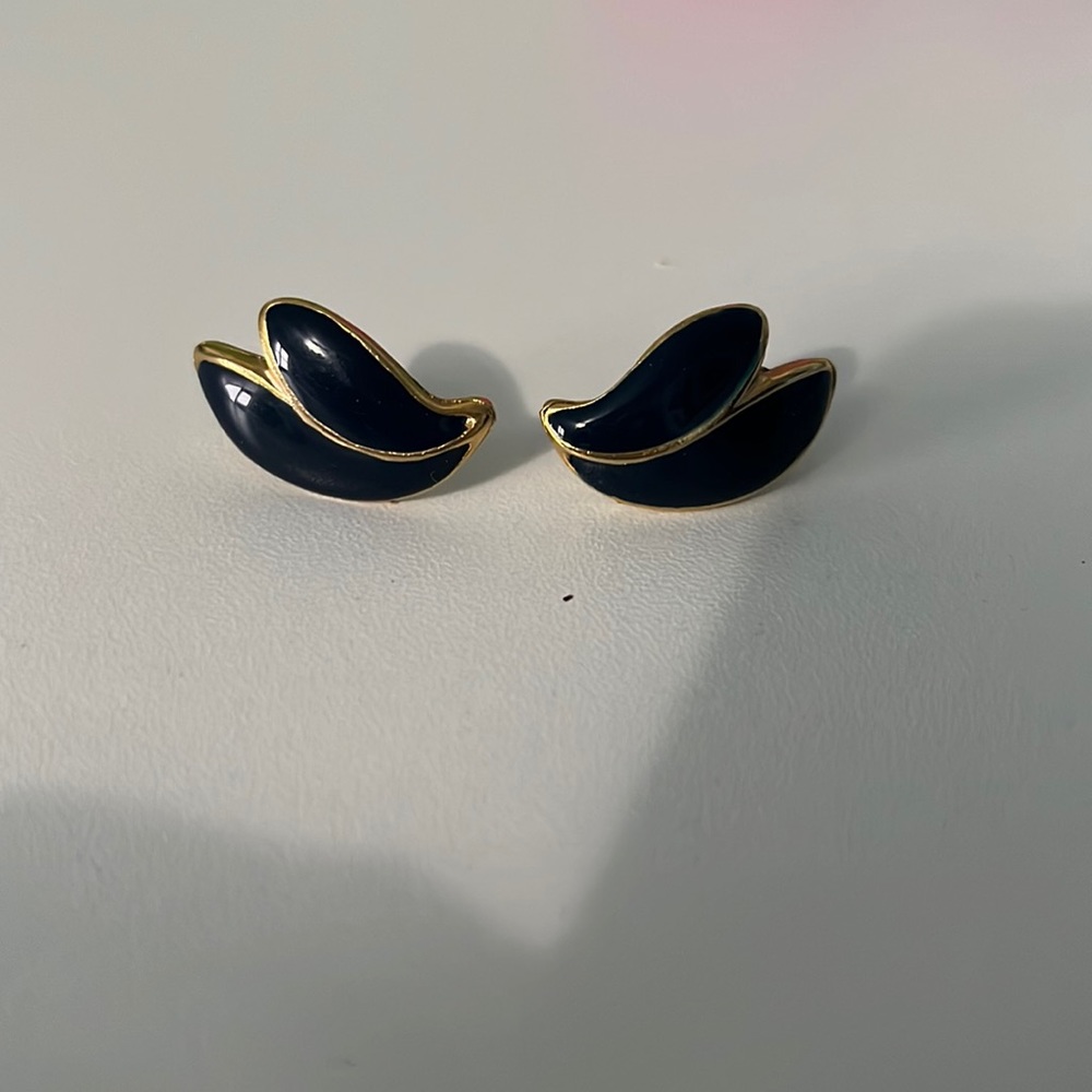 purple and gold earrings shaped as wings